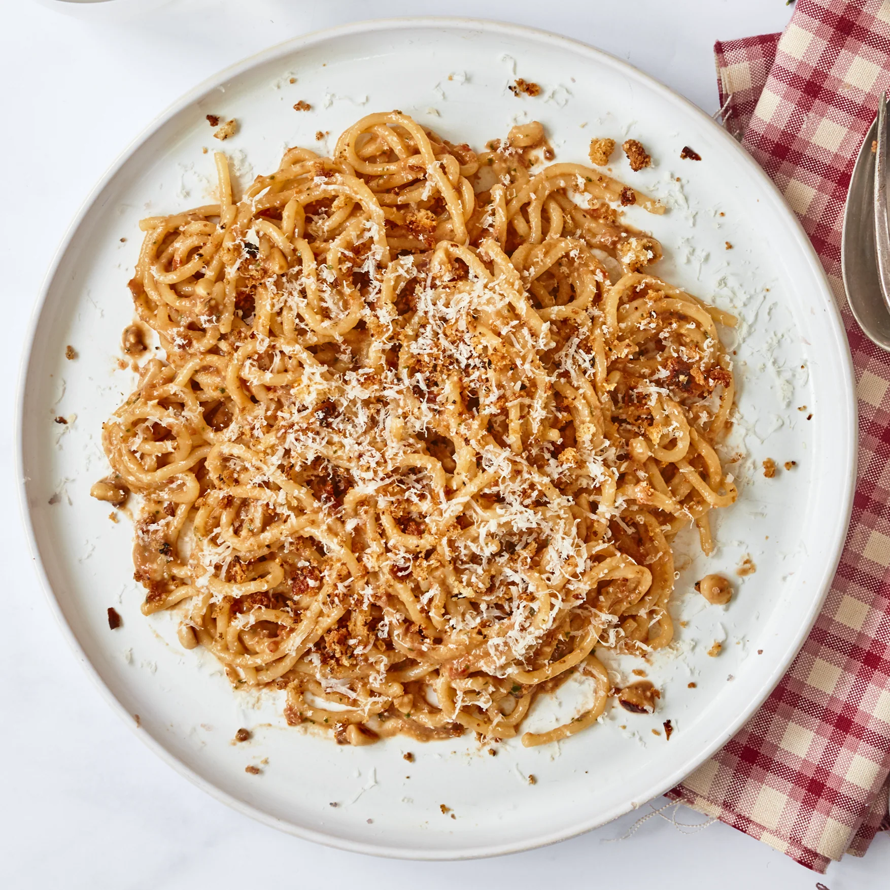 Bucatini with Sun-Dried Tomato Pesto, Salted Ricotta & Pangrattato