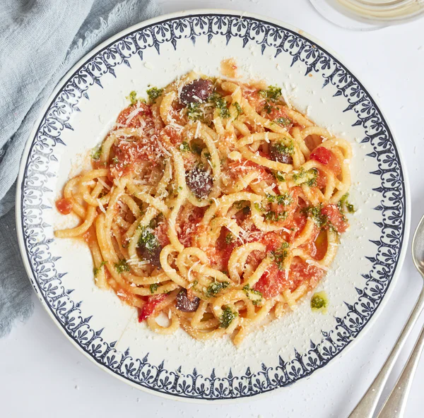 Pici With Arrabiata Sauce, Olives & Parsley Oil
